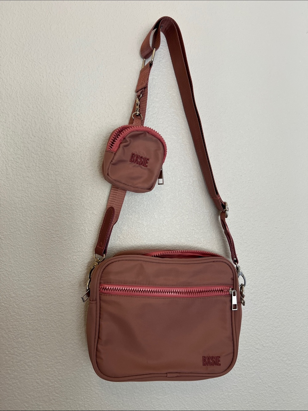 Bxsie Nomadic Book Crossbody Bag in color Rosy